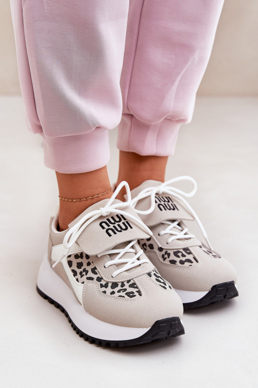 baskets Chaussures modèle baskets Féminin avec une plateforme avec des motifs en fourrure de léopard Blanc-beige Pumbes