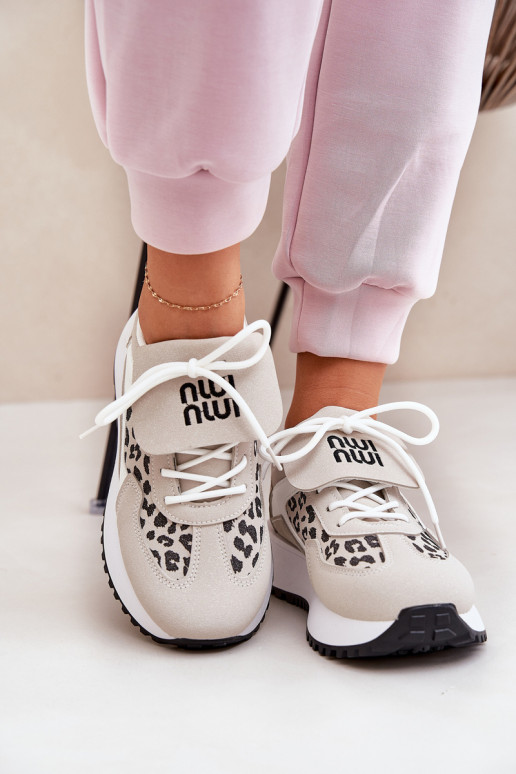 baskets Chaussures modèle baskets Féminin avec une plateforme avec des motifs en fourrure de léopard Blanc-beige Pumbes