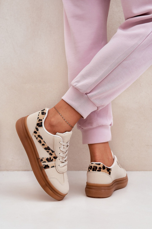 Féminin Chaussures modèle baskets avec une plateforme avec des motifs en fourrure de léopard beige Totter Féminin Chaussures modèle baskets avec une plateforme avec des motifs en fourrure de léopard beige Totter