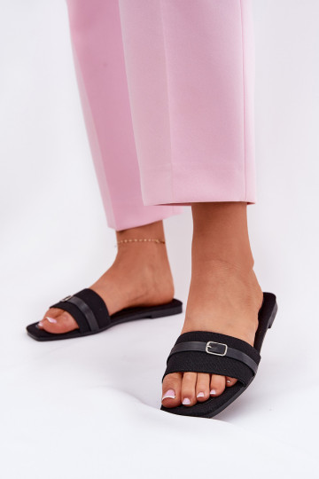 Mules à semelles plates femmes avec des lanières et des boucles couleur noir Zilina