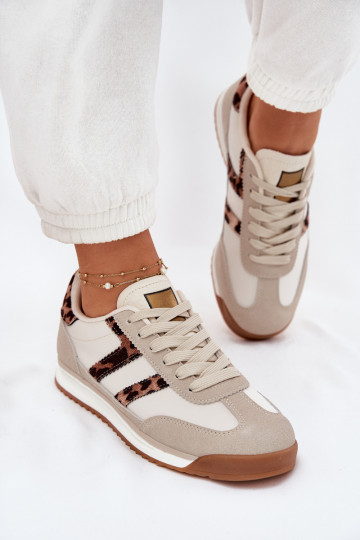 Faible Chaussures modèle baskets Féminin avec des motifs en fourrure de léopard beige Rulaana