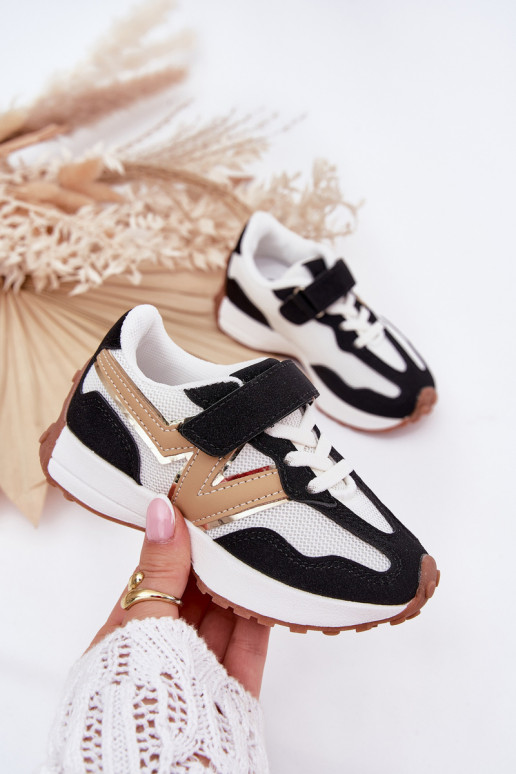 Chaussures modèle baskets Puéril avec attaches adhésives Blanc-couleur noire Tezzu Chaussures modèle baskets Puéril avec attaches adhésives Blanc-couleur noire Tezzu