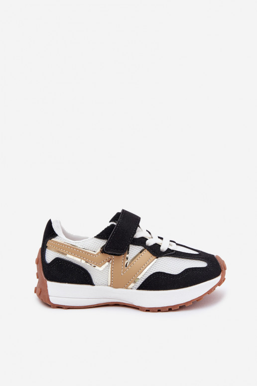 Chaussures modèle baskets Puéril avec attaches adhésives Blanc-couleur noire Tezzu Chaussures modèle baskets Puéril avec attaches adhésives Blanc-couleur noire Tezzu