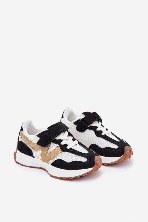 Chaussures modèle baskets Puéril avec attaches adhésives Blanc-couleur noire Tezzu Chaussures modèle baskets Puéril avec attaches adhésives Blanc-couleur noire Tezzu