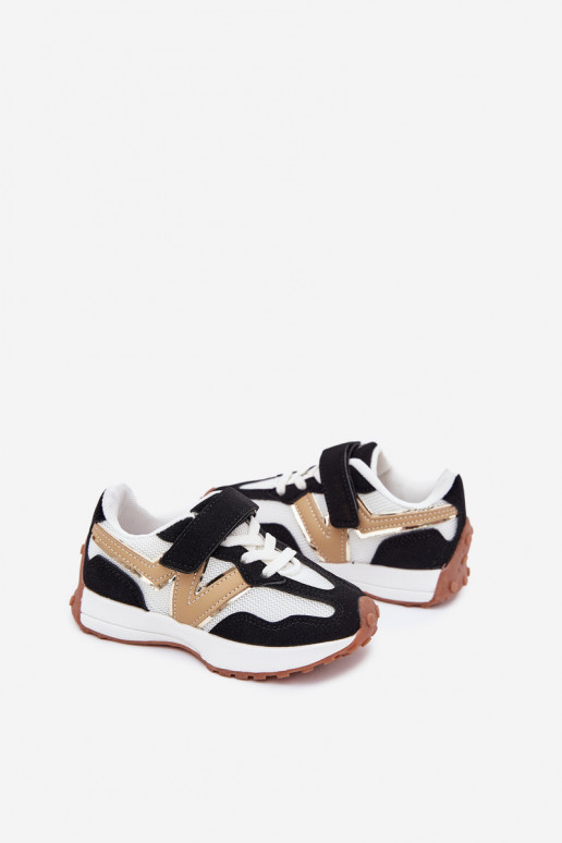 Chaussures modèle baskets Puéril avec attaches adhésives Blanc-couleur noire Tezzu Chaussures modèle baskets Puéril avec attaches adhésives Blanc-couleur noire Tezzu