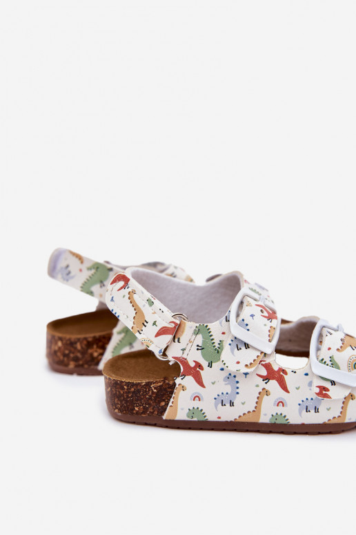 Sandales pour enfants Sur une semelle en liège avec boucles Dinosaures Couleurs différentes Thessa Sandales pour enfants Sur une semelle en liège avec boucles Dinosaures Couleurs différentes Thessa