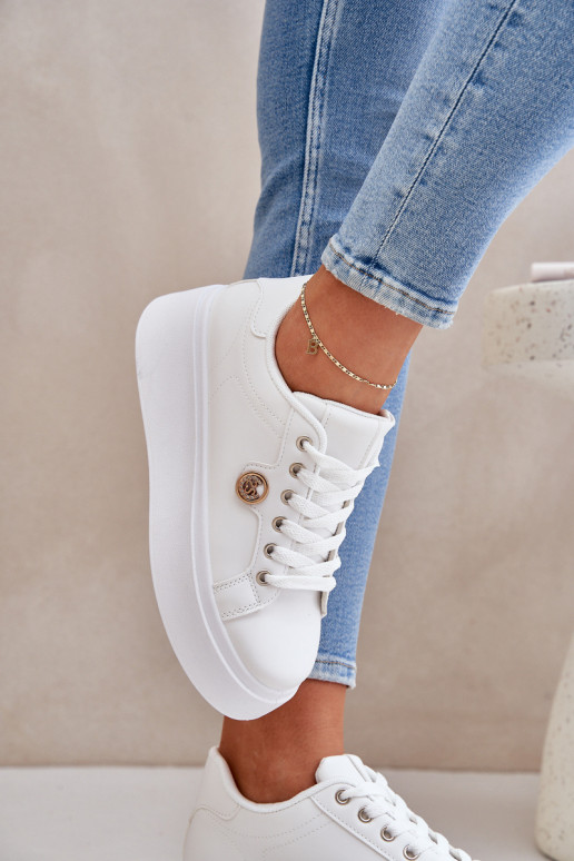 Eko Peau Chaussures modèle baskets avec une plateforme Ze couleur doréem Detalem couleur blanche Zingie Eko Peau Chaussures modèle baskets avec une plateforme Ze couleur doréem Detalem couleur blanche Zingie