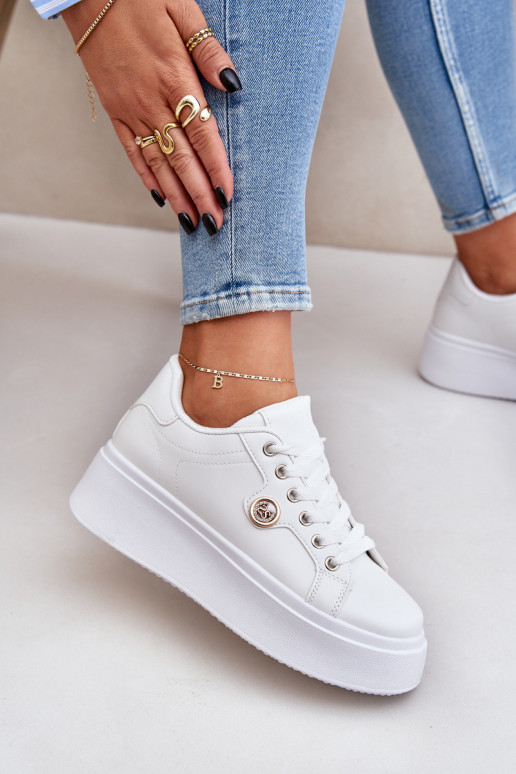 Eko Peau Chaussures modèle baskets avec une plateforme Ze couleur doréem Detalem couleur blanche Zingie Eko Peau Chaussures modèle baskets avec une plateforme Ze couleur doréem Detalem couleur blanche Zingie