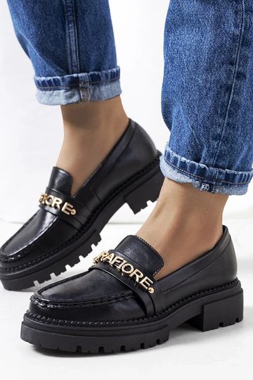 Mocassins noirs à semelle...