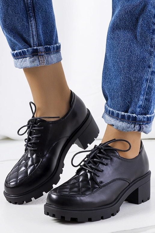 Bottines noires à talon épais, «...