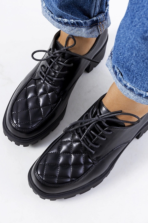 Bottines noires à talon épais, «...