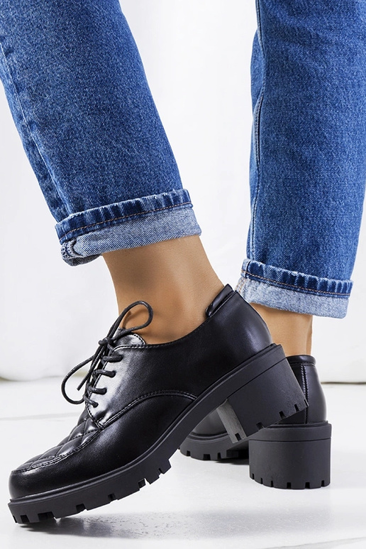 Bottines noires à talon épais, «...