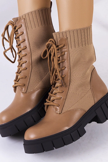 Bottines brunes avec tige... 2