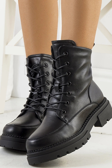 Bottines noires ajustées en...