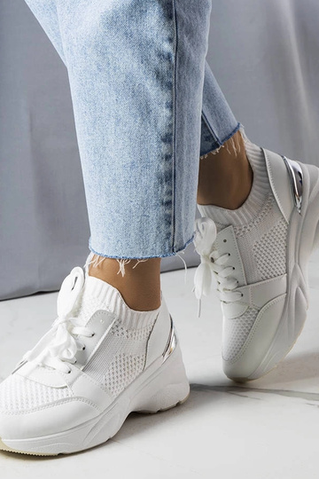 Baskets blanches sur...