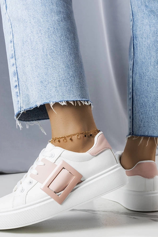 Baskets blanches décorées d'une... Baskets blanches décorées d'une...