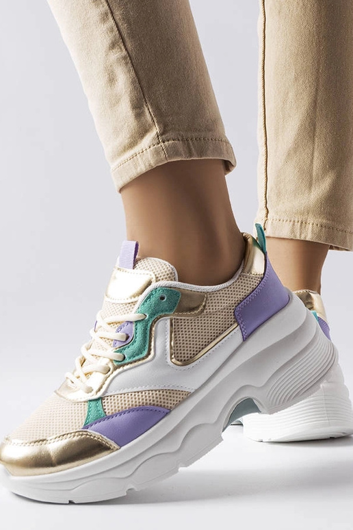 Baskets blanches et dorées pour femme... Baskets blanches et dorées pour femme...