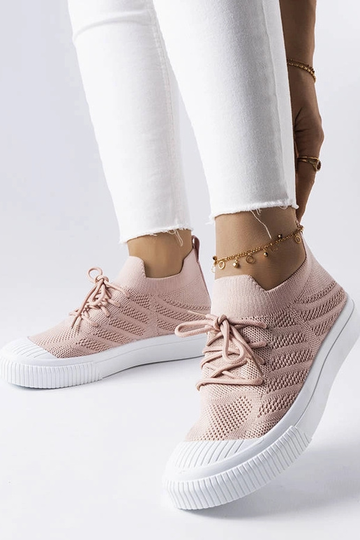 Chaussures roses en matériau...