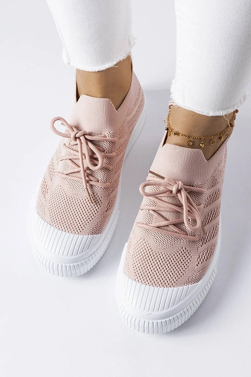 Chaussures roses en matériau...