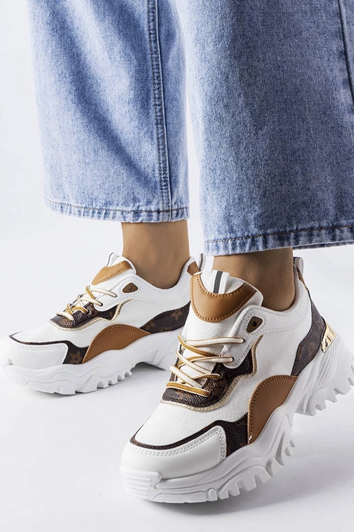 Baskets blanches à semelle... Baskets blanches à semelle...