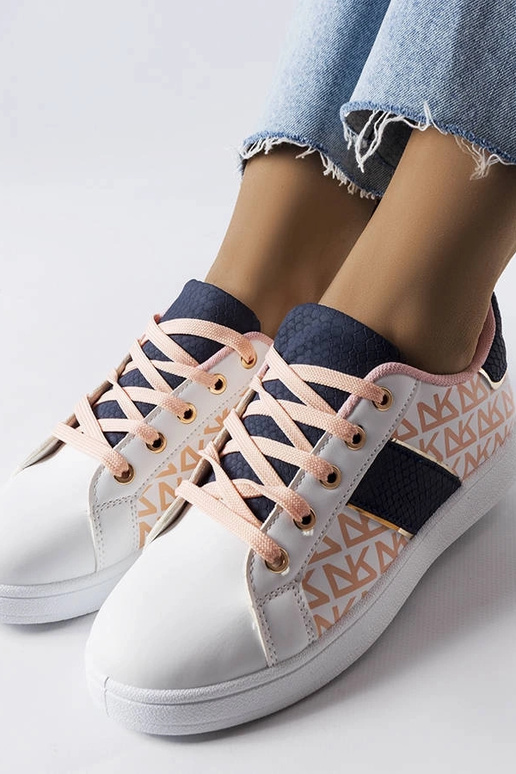 Baskets blanches à empiècements... Baskets blanches à empiècements...