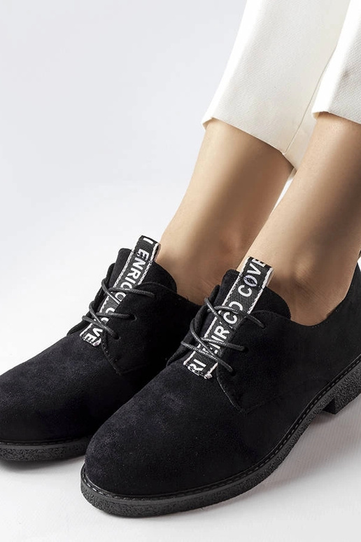 Ballerines en simili daim noires...