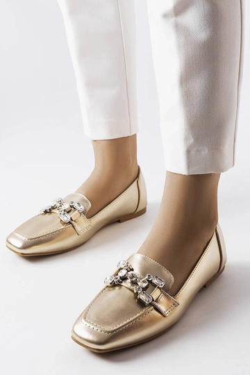 Mocassins en or avec...