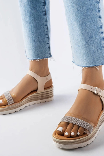 Sandales compensées beiges...