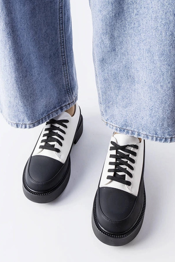Chaussures plates blanches Merico