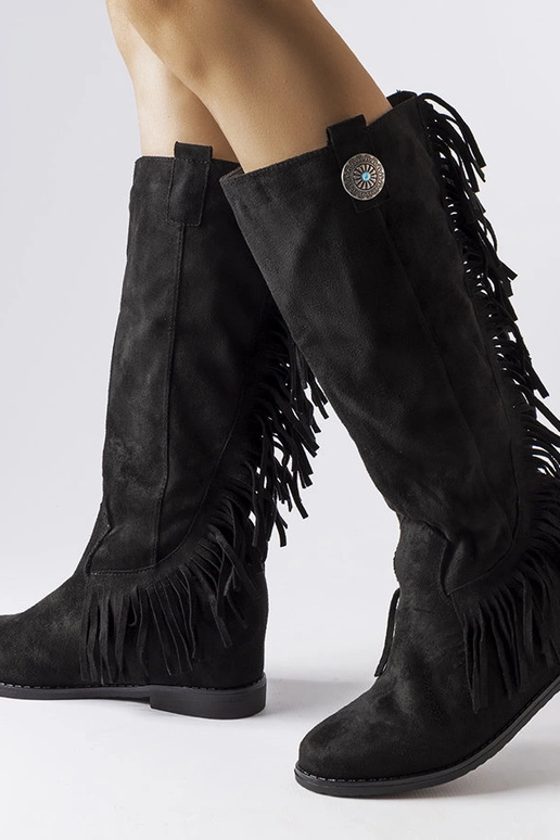 Bottes noires à semelle compensée... Bottes noires à semelle compensée...