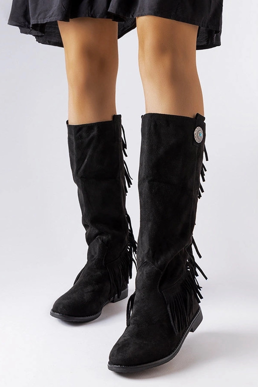 Bottes noires à semelle compensée... Bottes noires à semelle compensée...