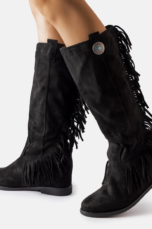 Bottes noires à semelle compensée... Bottes noires à semelle compensée...