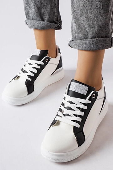 Chaussures Palais noires et blanches avec accent argenté