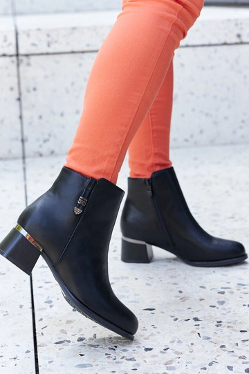 Bottines noires à talon en...