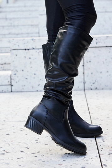 Bottes Angelico noires à volants