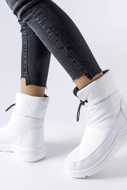 Bottes de neige isolées blanches pour...