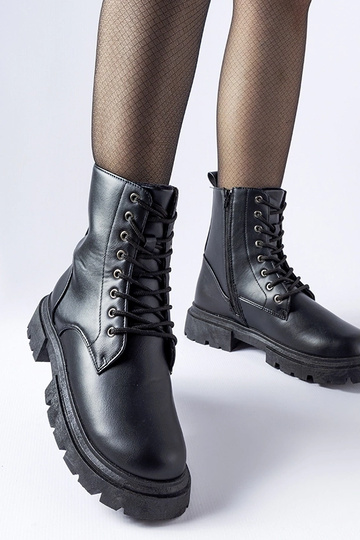 Bottes noires isolées pour...