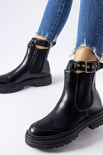 Bottines noires à fermoir...