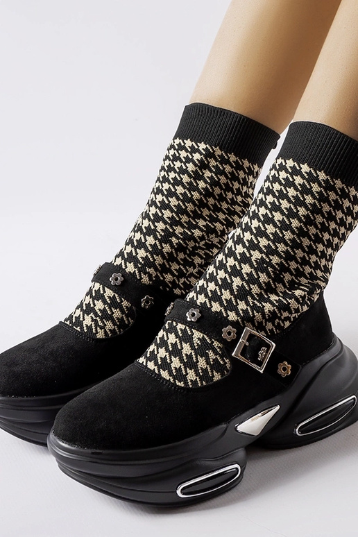 Bottines noires à motif pied-de-poule... Bottines noires à motif pied-de-poule...