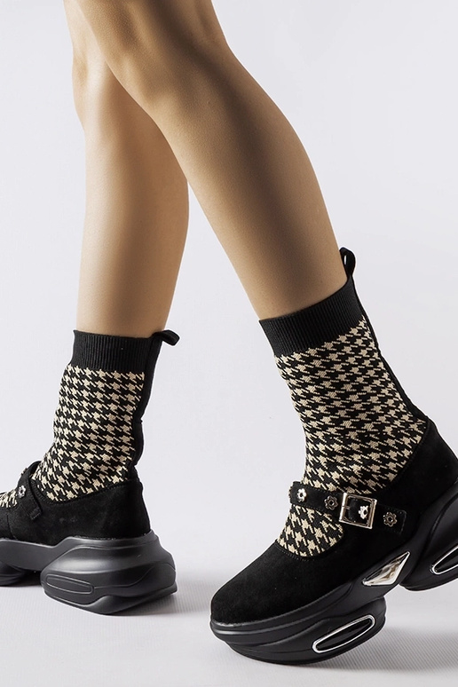 Bottines noires à motif pied-de-poule... Bottines noires à motif pied-de-poule...