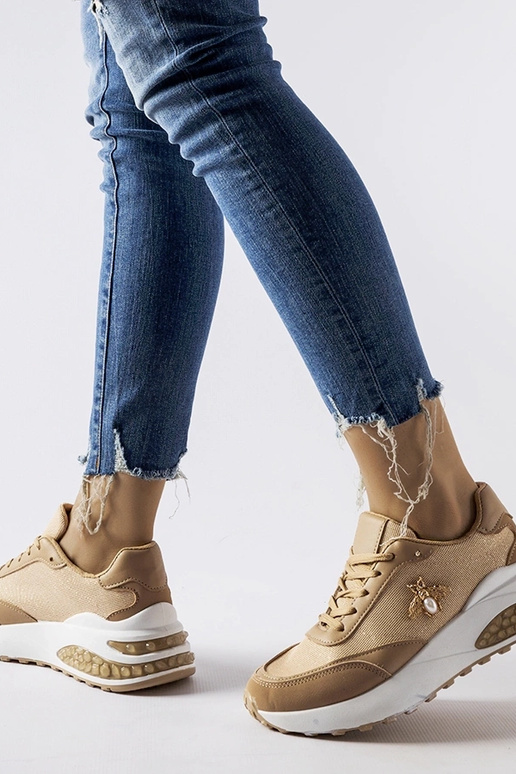 Baskets marron et blanches avec fil...