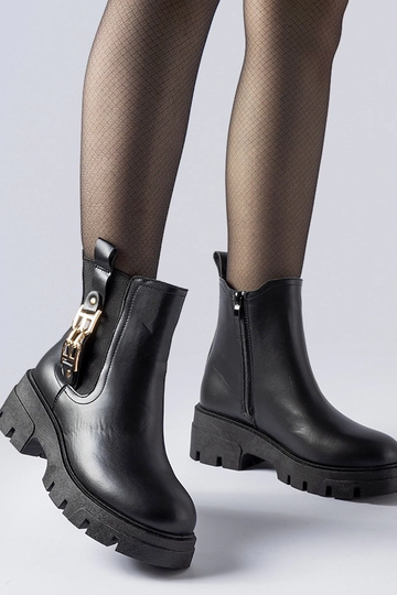 Bottines massives noires...