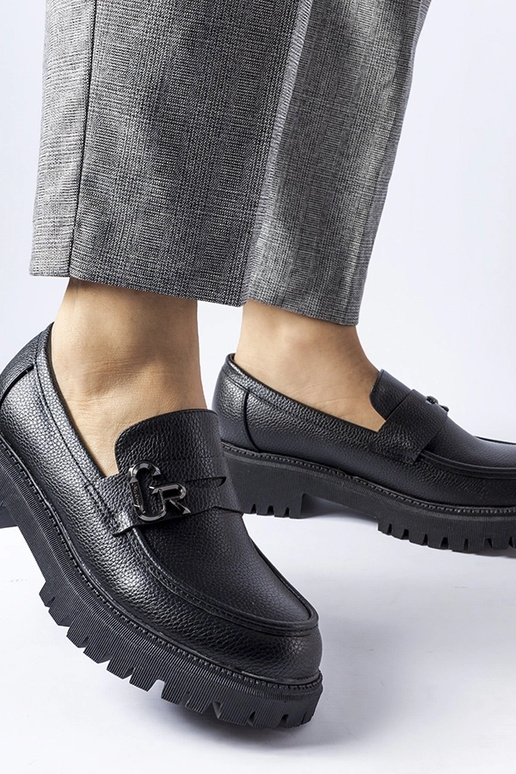 Mocassins classiques noirs avec une...