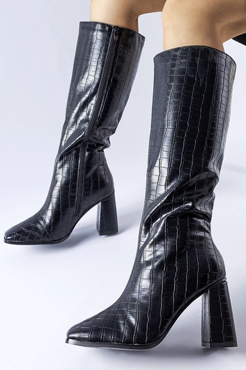 Bottes noires rembourrées à...