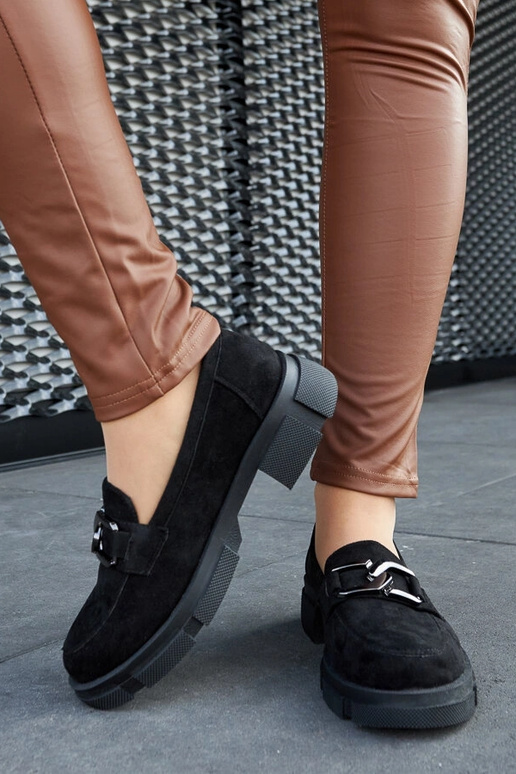 Mocassins noirs massifs avec boucle...