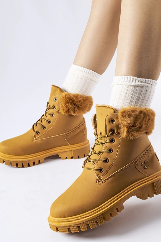 Bottes marron avec fourrure...