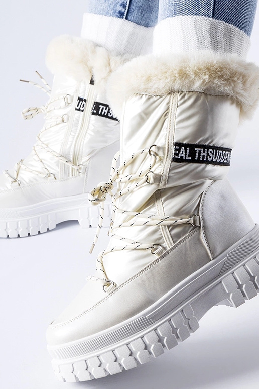 Bottes de neige isolées beiges avec...