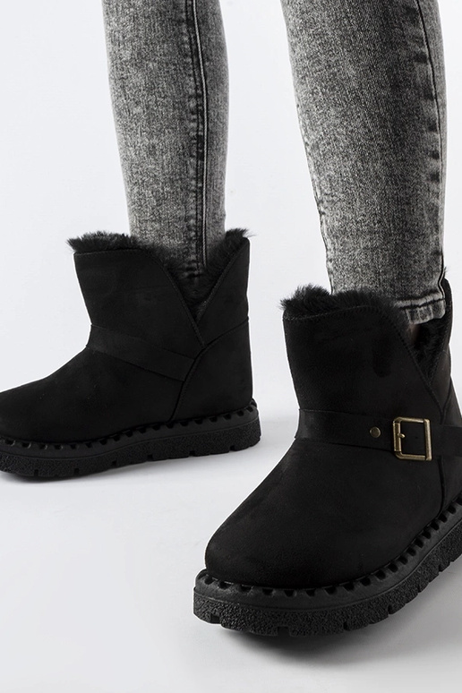 Bottes de neige noires isolées avec...