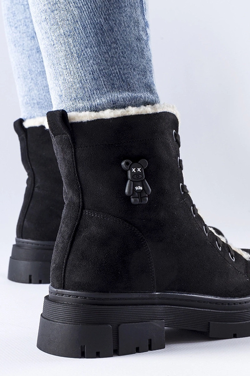 Bottes isolées noires en daim...