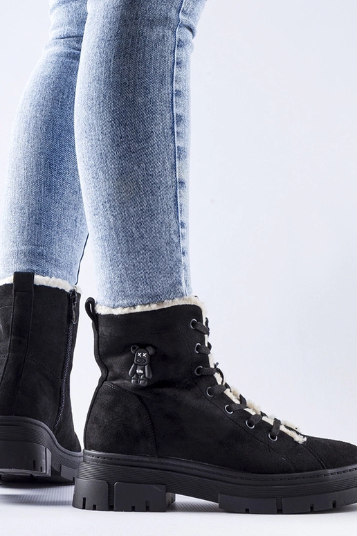 Bottes isolées noires en daim...